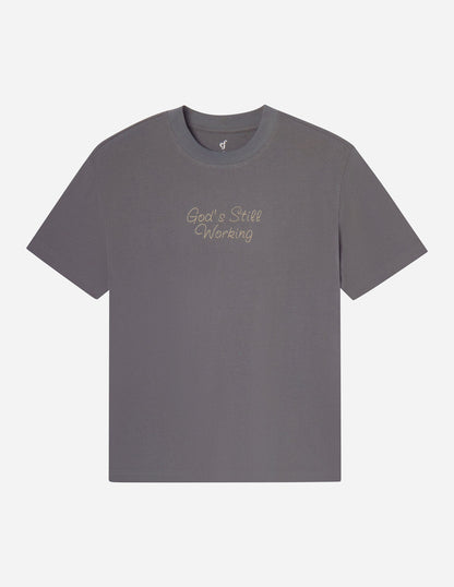 God's Still Working Unisex Tee